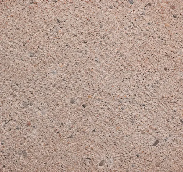 Concrete surface with ground-up clay bricks