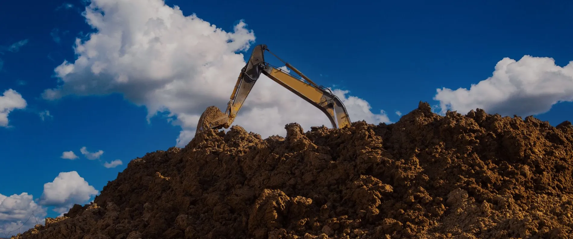 Yellow excavator on construction sites